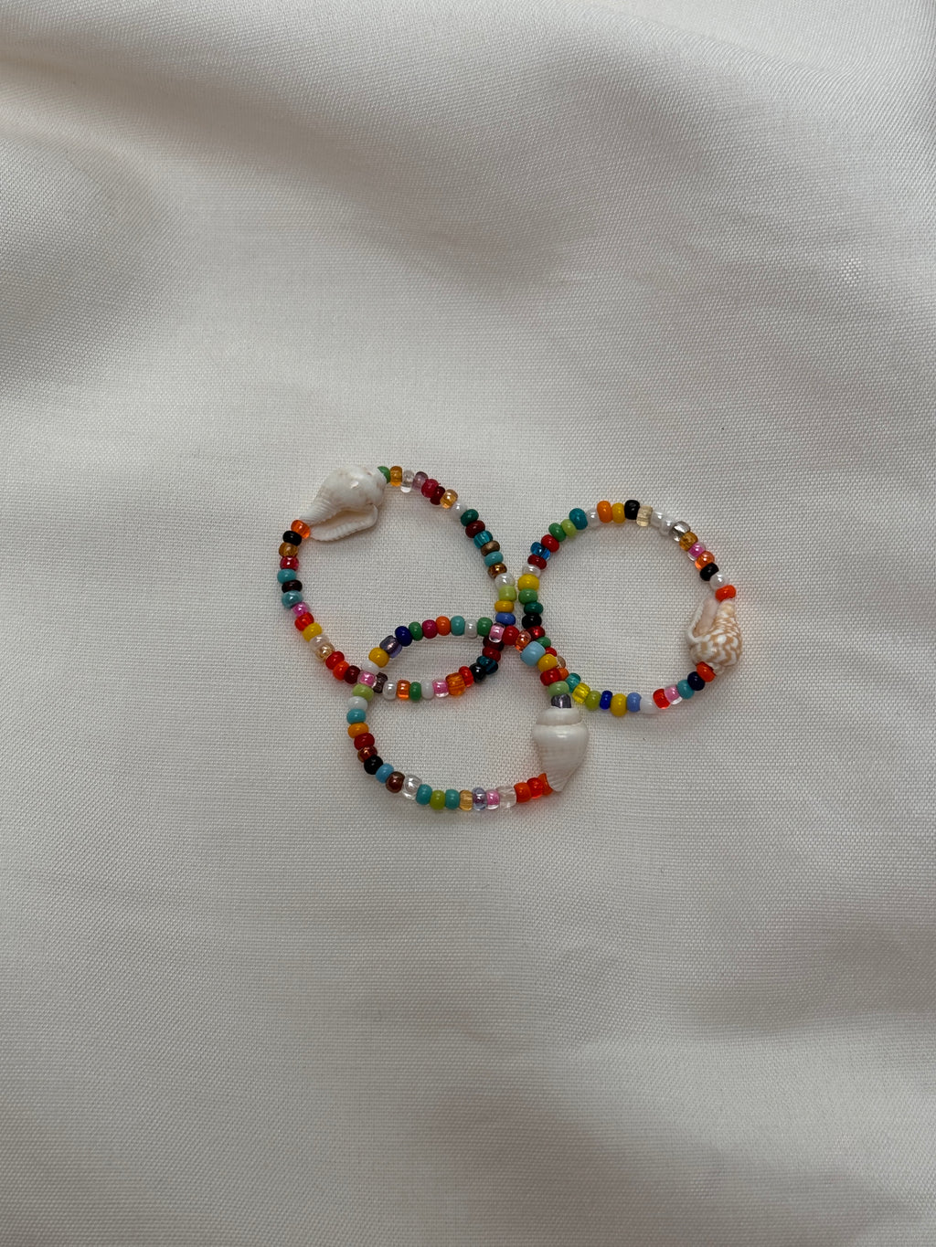 Bague perles multicolores & coquillage