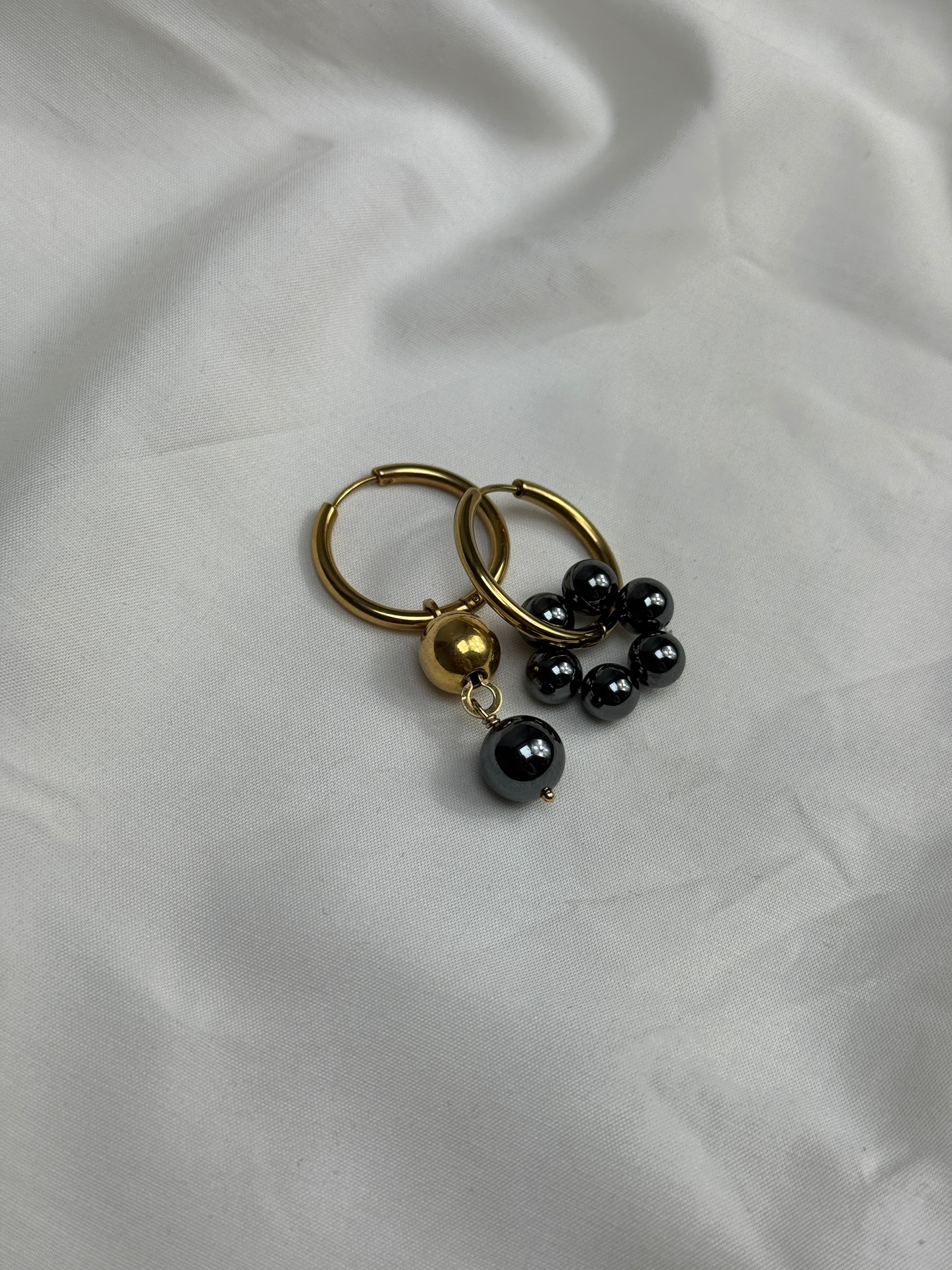 Paire grandes créoles dorées hématites #1